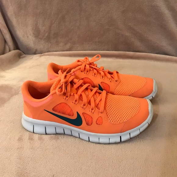 bright orange nike sneakers